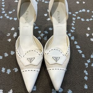 White Prada leather and canvas pointy toe pumps